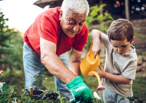 guy in garden with grandson