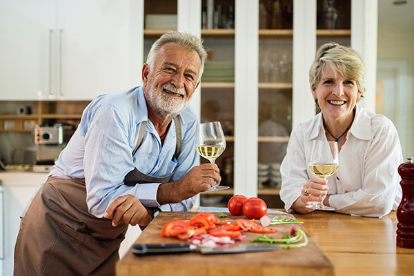 older couple drinking wine
